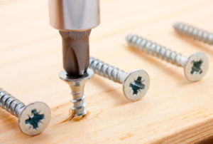 Cross-tip screws are screwed into wood using a Phillips head screwdriver.