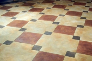 painted faux tiling on concrete floor