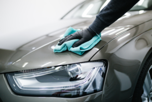 wiping off a shiny car