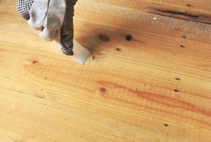 Someone uses wood filler.