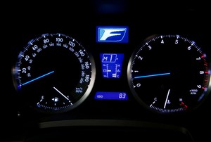 A speedometer on a car.