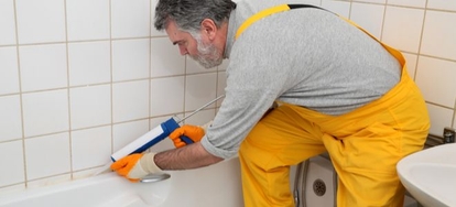 How to Caulk a Large Gap Between Tub and Tile | DoItYourself.com