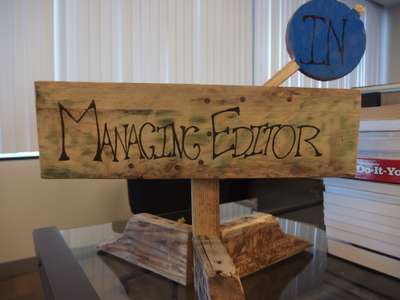 Managing Editor sign