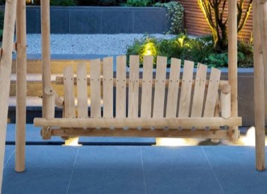 wood swing set on patio