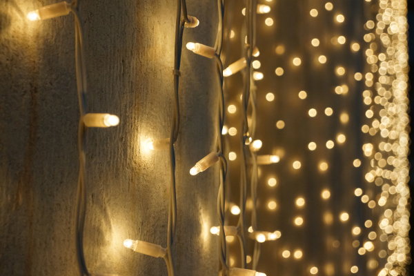 Drape a string of lights across tables or mantelpieces and accent them with a fe