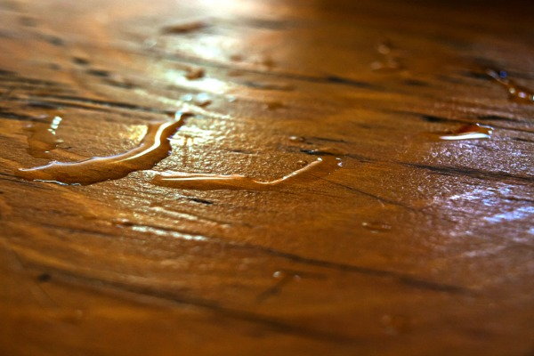 water droplets on a hardwood floor
