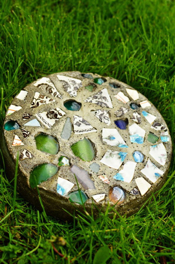 mosaic stepping stone in the grass