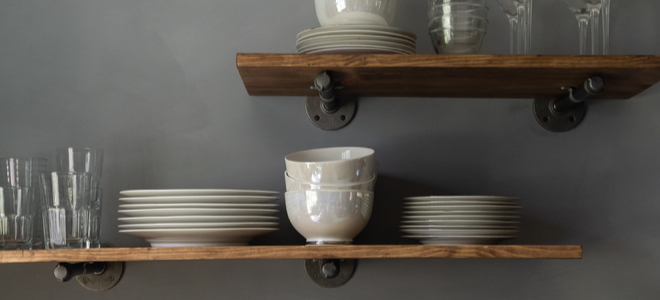 floating shelves with glasses plates and cups