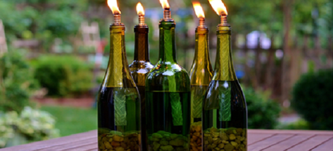 wine bottle torches on table