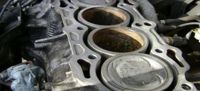 What are the signs of a blown head gasket?