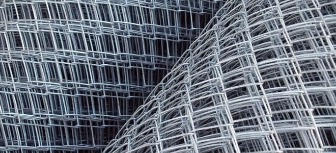 Rolls of mesh wire fencing