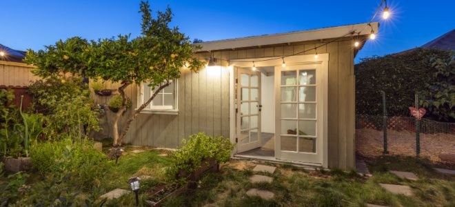 tiny home with tree and lights