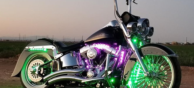 green and purple lights on a motorcycle