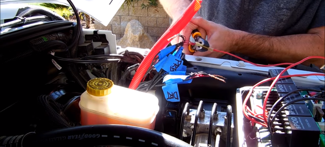 crimping a wire in a car engine