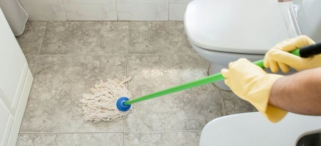 mopping the bathroom floor