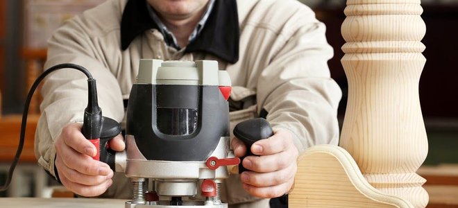 Man working with a router