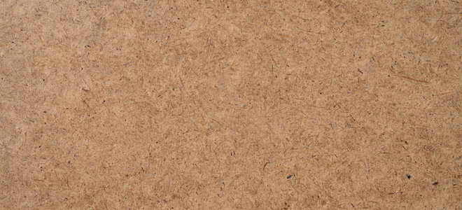 A close-up of hardboard texture.
