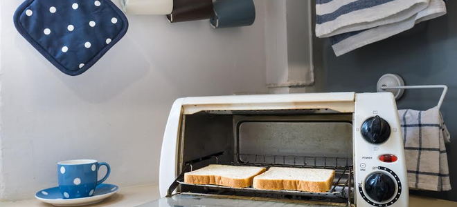 white toaster oven on counter in a kitchen