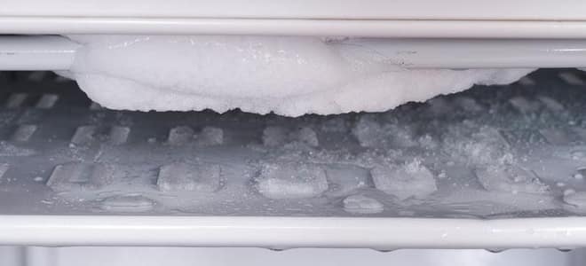 A freezer with ice in it. 