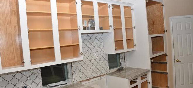 A kitchen in the process of cabinet installation.