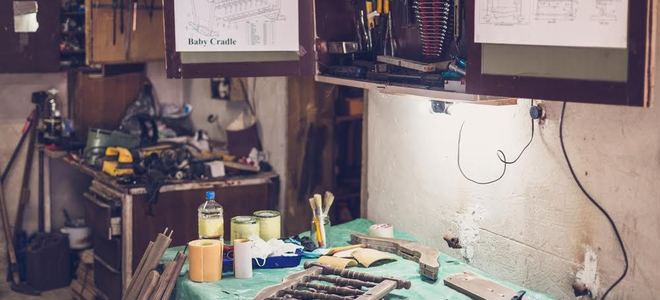 work bench with cabinet above