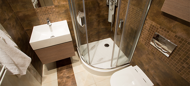 tiled walls and flooring in bathroom