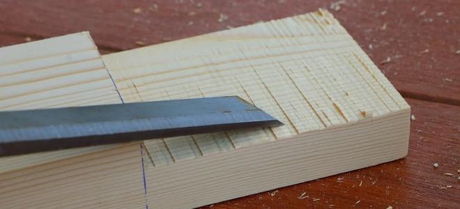 A rabbet joint cut into a piece of lumber.
