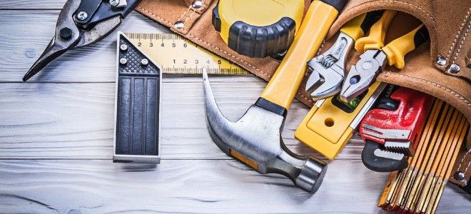 assortment of tools in a tool belt