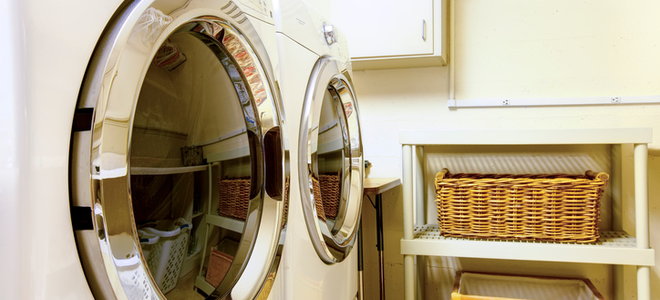 A washer and dryer set in a laundry room. 
