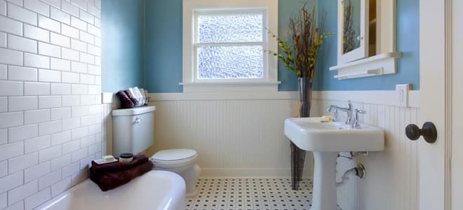A white and blue bathroom. 