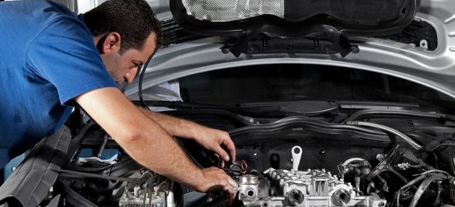 a person working on a car