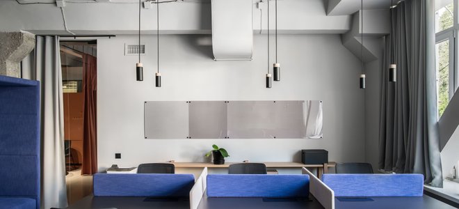 A room with a curtain wall partition.