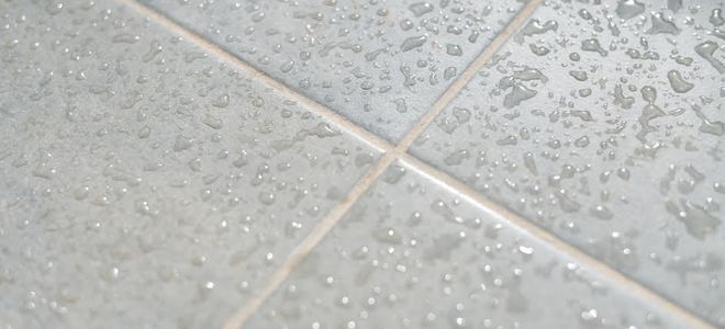wet grey floor tiles
