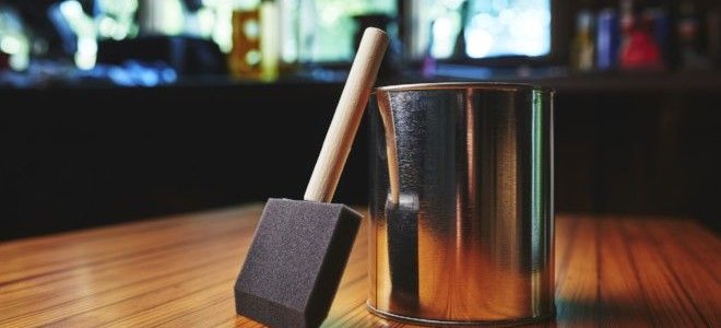 paint can and foam brush