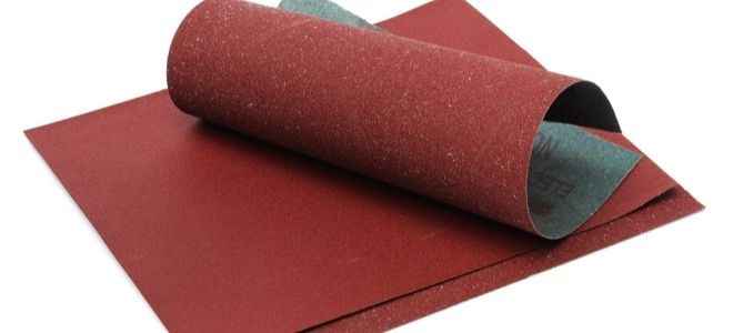 sheets of red sandpaper