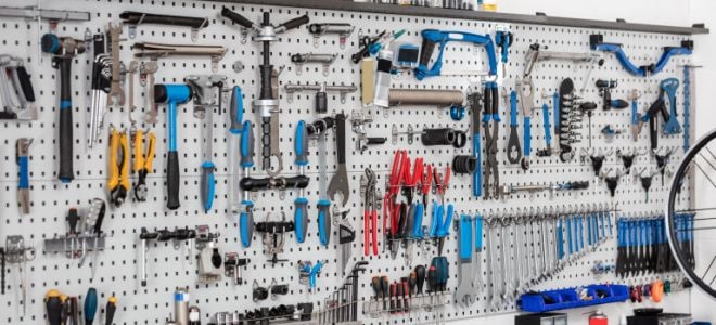 tools on a pegboard wall