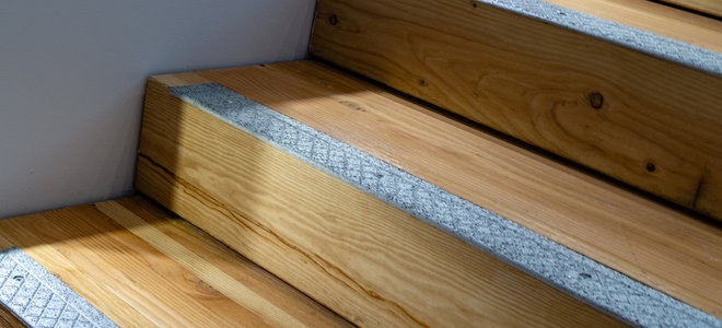 wood stairs with tread on the edge