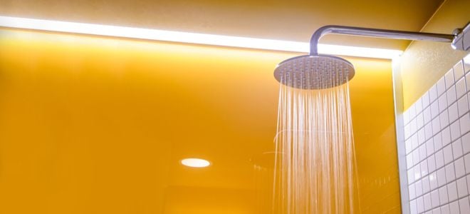 rain showerhead in yellow shower