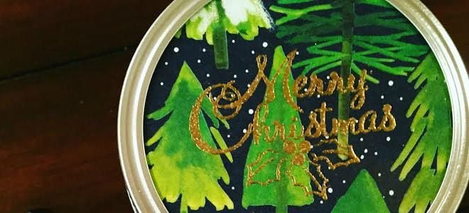 A mason jar lid decorated in a Christmas lid. 