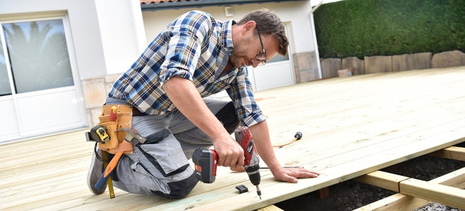 man working on a deck