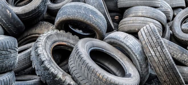 pile of tires in a junk yard