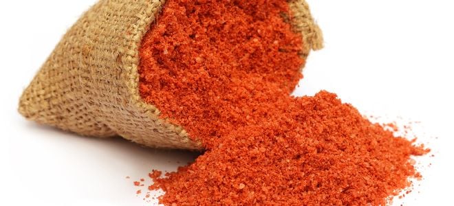 red salty powder in brown bag
