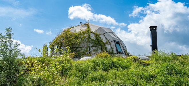 dome home in natural landscape