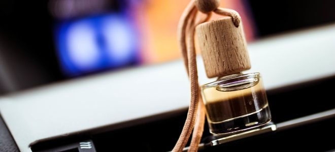 essential oil jar hanging in a car