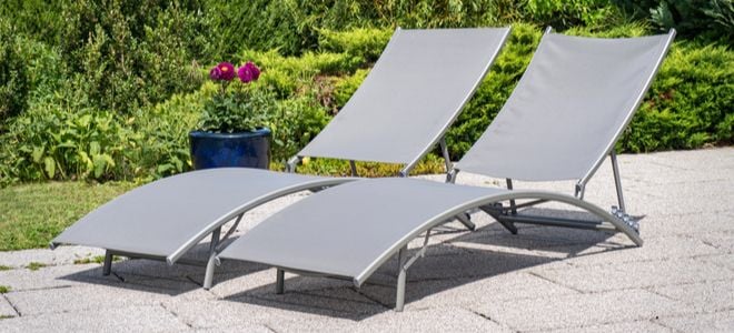 reclining patio chairs on stone