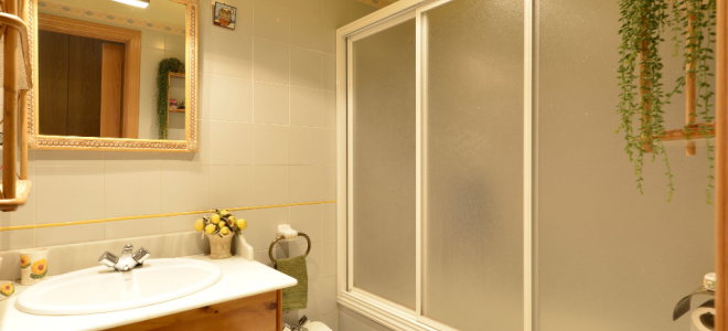 bathroom with shower bath sliding doors