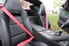 black seats with red seat belts