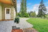 landscaped yard and concrete patio