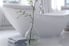 stylish bathroom with freestanding curved bathtub