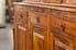 A close-up of a wood cabinet.